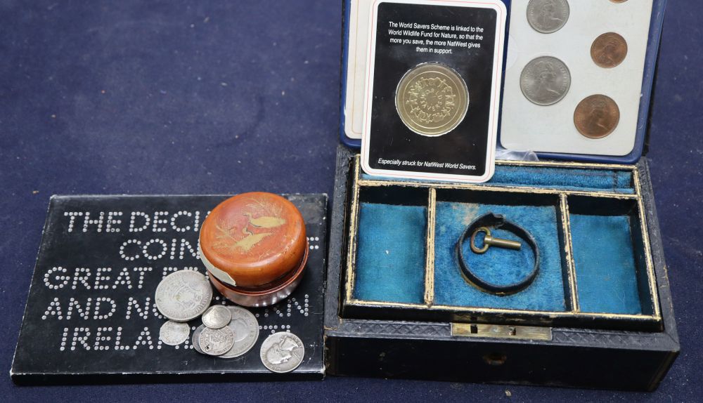 A group of assorted coins, some silver